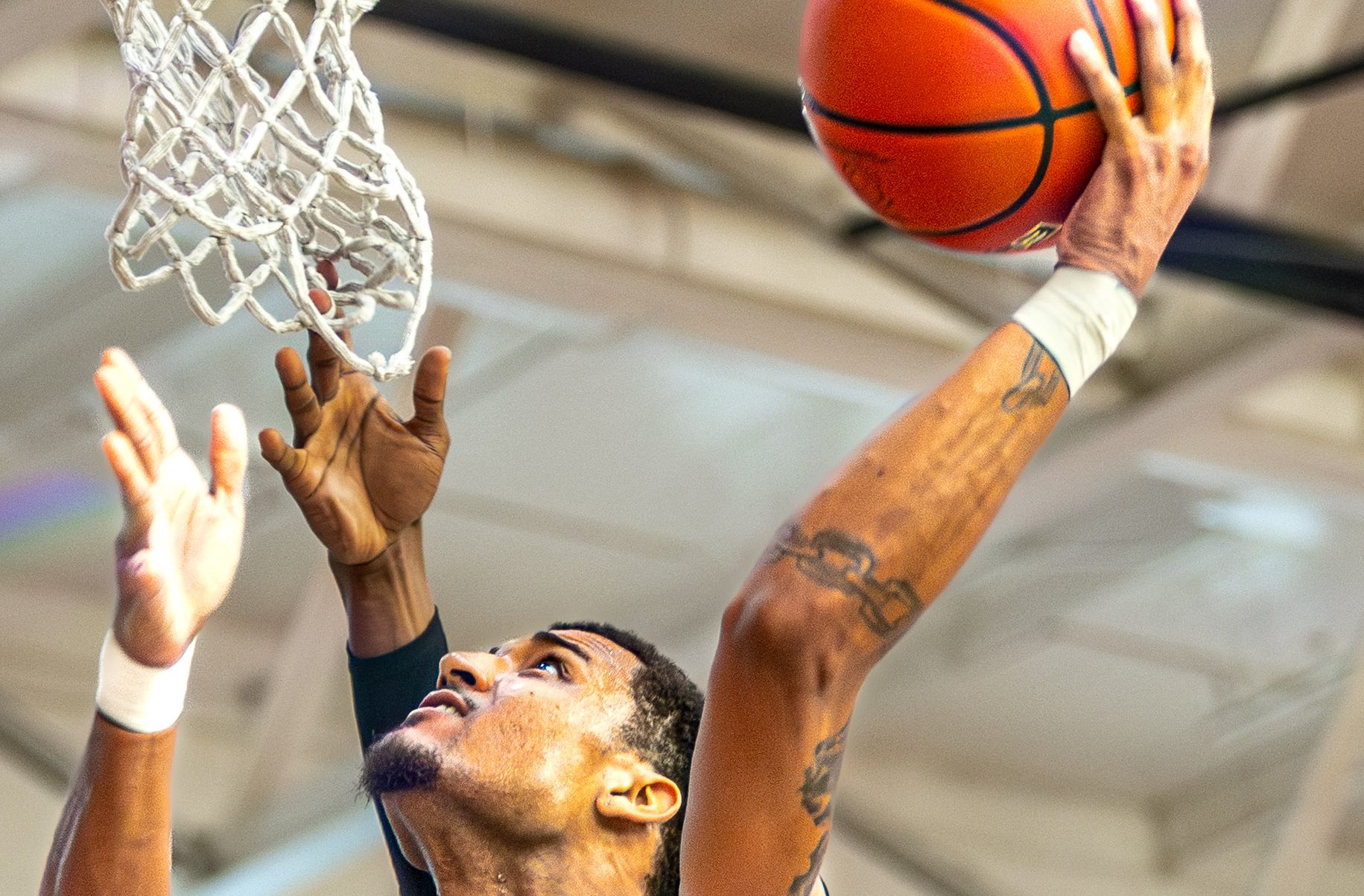 Sharks number zero finishing a layup against a Baltimore defender